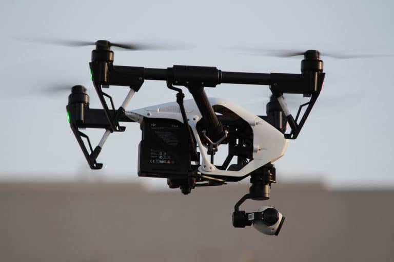 close-up-camera-hanging-against-sky